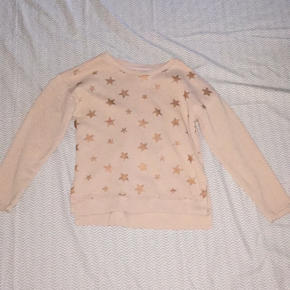 PEEK pink sweatshirt with rose gold stars.